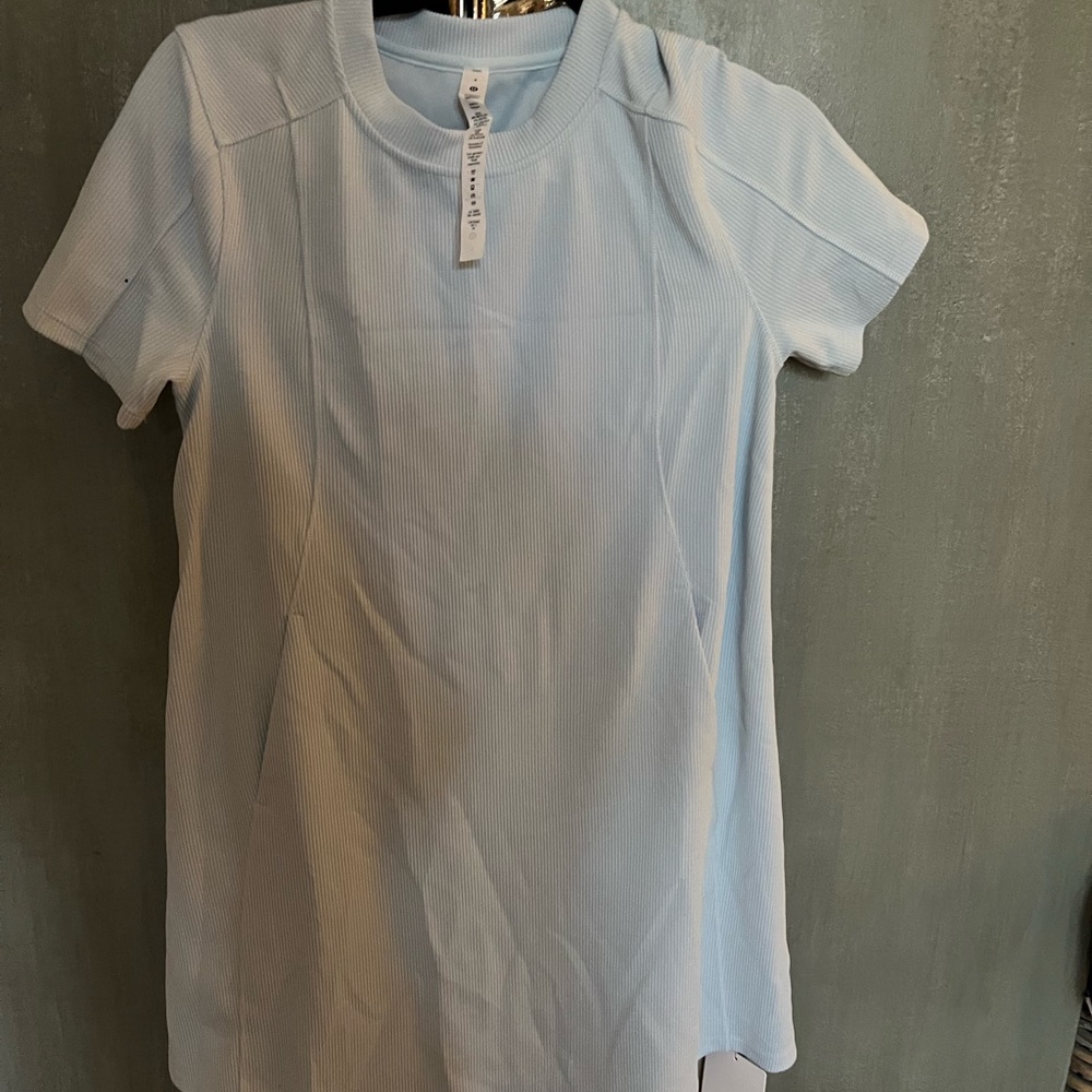 Nwt Lululemon dress. Has pockets never worn. Size S